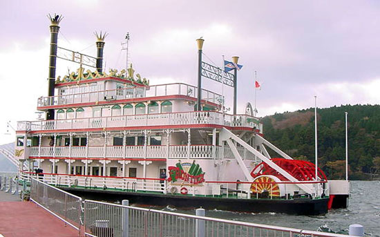 Frontier, the sea pirate ship or kaizokusen picks sightseers at port of Moto-Hakone on lake Ashi
