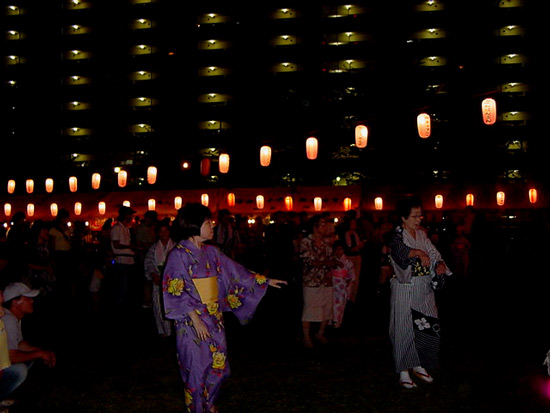 traditional japanese dancers in yukata at the summer festival in akishima, tokyo